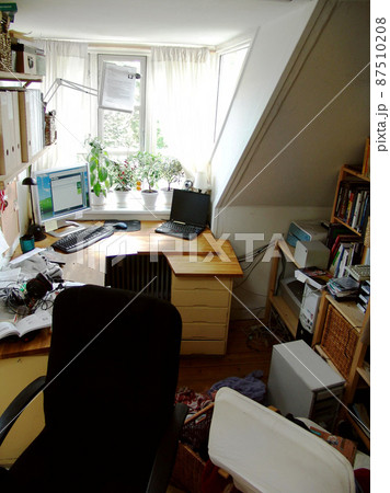 Bachelors Dorm Room. A candid image of a home workspace. Bachelors Dorm Room. A candid image of a home workspace. 87510208