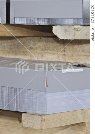 Galvanized sheet in packs in metal products warehouse Galvanized sheet in packs in metal products warehouse 87510226