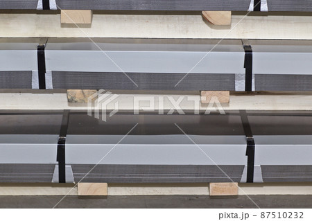 Galvanized sheet in packs in metal products warehouse Galvanized sheet in packs in metal products warehouse 87510232