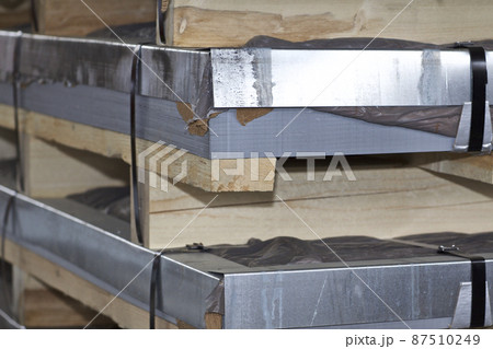 Galvanized sheet in packs in metal products warehouse Galvanized sheet in packs in metal products warehouse 87510249