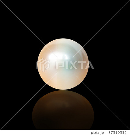 Created in the ocean. Studio shot of a large pearl. 87510552