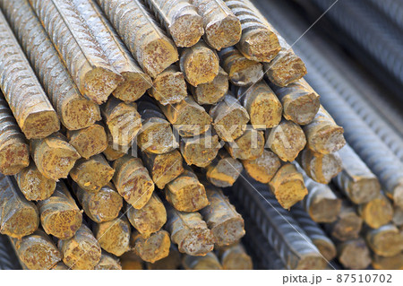 Reinforcing bars with a periodic profile in the packs are stored in the metal products warehouse Reinforcing bars with a periodic profile in the packs are stored in the metal products warehouse 87510702