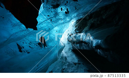 An ice cave of incredible beauty. Blue gradient An ice cave of incredible beauty. Blue gradient 87513335