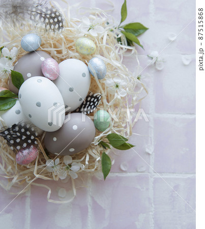Easter eggs in straw nest 87515868