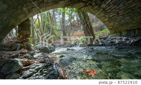 Venetian stone bridge on Krios river, historical medieval landmark in Cyprus, view from under the bridge 87522910