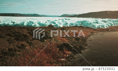 glacier flow through the mountains in Iceland glacier flow through the mountains in Iceland 87523031