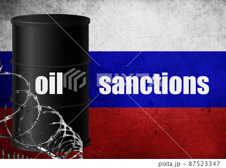 Oil sanctions against Russia barrel barbed wire Russian flag background 87523347