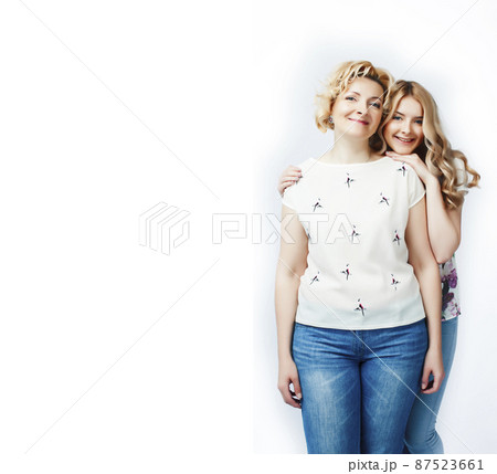 mother with daughter together posing happy smiling isolated on white background with copyspace, lifestyle people concept mother with daughter together posing happy smiling isolated on white background with copyspace, lifestyle people concept 87523661