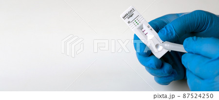 Positive test result by using rapid test device for COVID-19. Positive test result by using rapid test device for COVID-19. 87524250
