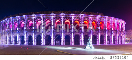 Panorama of colorful lighted Arena of Nimes 87535194