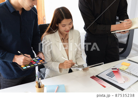 A group of creative interior designers are working together 87535238