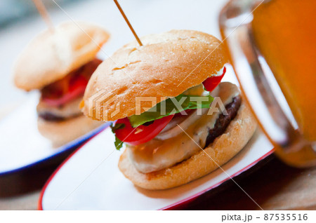 Beef burger served in cafe Beef burger served in cafe 87535516