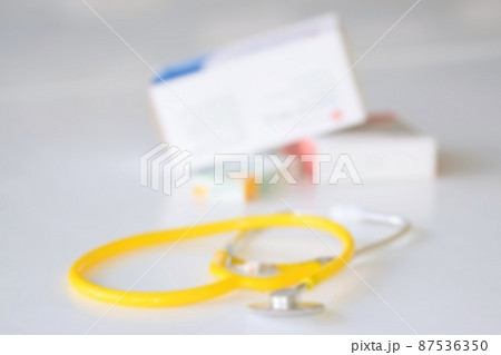 Stethoscope with medication on the table. Concept for health and medicine. Hospital background. Stethoscope with medication on the table. Concept for health and medicine. Hospital background. 87536350