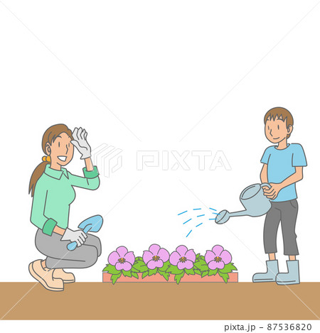 花壇に花を植える母親と子供 87536820