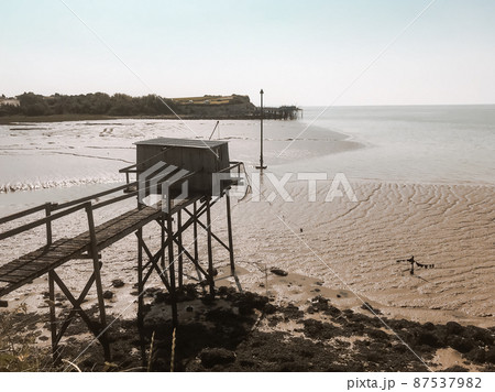 Traditional fishing cabin and net - Carrelet - Talmont sur Gironde, France Traditional fishing cabin and net - Carrelet - Talmont sur Gironde, France 87537982