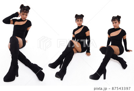20s Asian Indian Arab Woman wear black dress braided hair and long boots shoes on white background 20s Asian Indian Arab Woman wear black dress braided hair and long boots shoes on white background 87543397