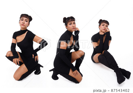 20s Asian Indian Arab Woman wear black dress braided hair and long boots shoes on white background 87543402