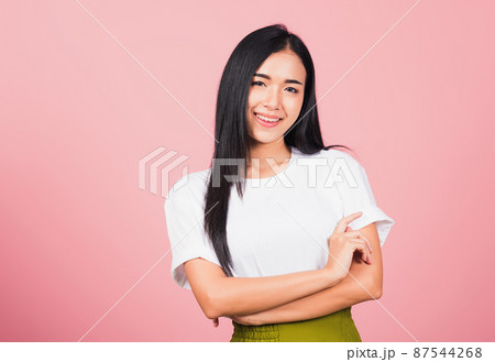 young woman standing her smile confidence with crossed arms 87544268
