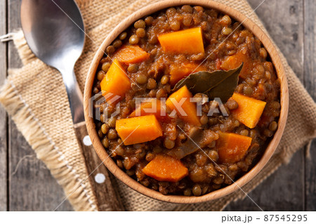 Lentil stew ragout with pumpkin and carrot in bowl 87545295