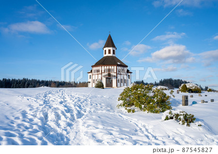 Wooden evangelic chapel in Tesarov in wintertime Wooden evangelic chapel in Tesarov in wintertime 87545827