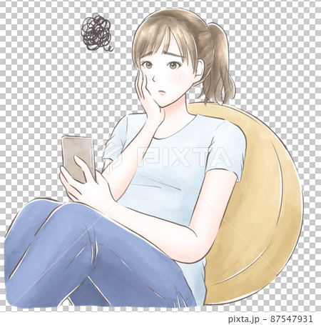 A woman who leans against a cushion, wears a cheek stick, and is worried about looking at a smartphone. 87547931