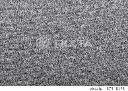Heather grey knitted fabric textured background Heather grey knitted fabric textured background 87548178