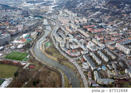 Aerial above view of river crossing the city Aerial above view of river crossing the city 87552688