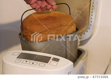 Bread baked in a bread maker. Selective focus. 87553066