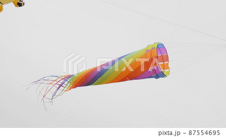 Color kite soaring in the sky 87554695