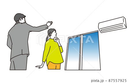 部屋の内見をする女性と案内するスタッフ 87557925