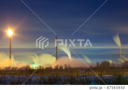 Smoke from pipes of the plant. 87563930