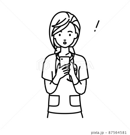 立ってスマートフォンを操作して何かに気づいて驚いた看護師の女性 87564581