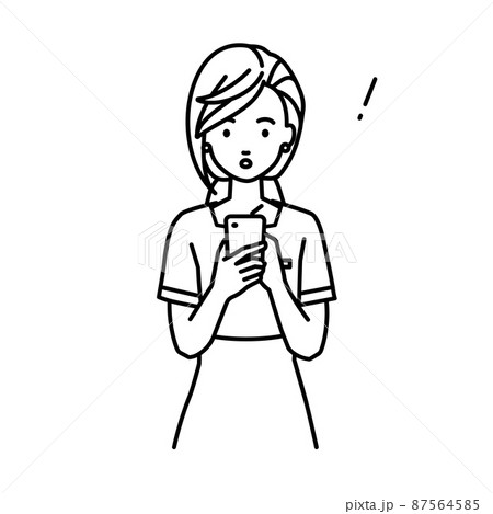 立ってスマートフォンを操作して何かに気づいて驚いたエステ店員・受付・接客業の女性 87564585
