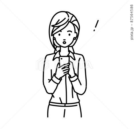 立ってスマートフォンを操作して何かに気づいて驚いたブラウスの女性 87564586