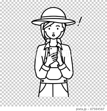 立ってスマートフォンを操作して何かに気づいて驚いた農家の女性 87564587