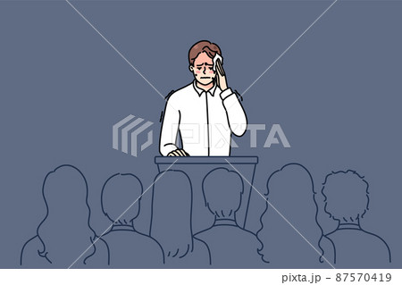 Nervous man scared of public speaking on stage Nervous man scared of public speaking on stage 87570419