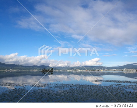 Panorama view of the Lake Suwa in the Kiso Mountains, Nagano, Japan. Panorama view of the Lake Suwa in the Kiso Mountains, Nagano, Japan. 87573322