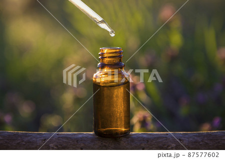 Natural medicine, aromatherapy - pipette & bottle. Natural medicine, aromatherapy - pipette & bottle. 87577602