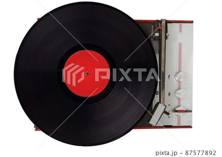 Vintage turntable playing vinyl close up. Vintage turntable playing vinyl close up. 87577892