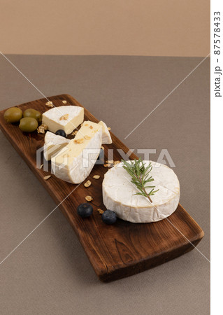 brie cheese on the brown plate 87578433
