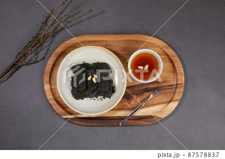 korean traditional dessert, rice cake Injeolmi and jujube tea korean traditional dessert, rice cake Injeolmi and jujube tea 87578837