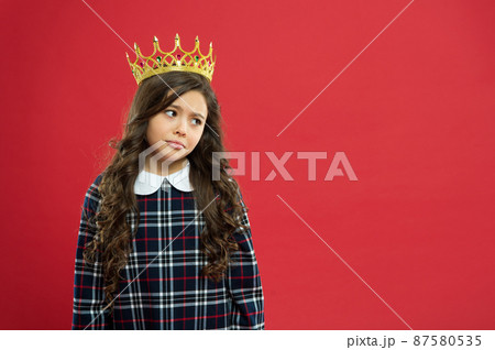 Princess manners. Girl wear crown red background. Princess manners. Girl wear crown red background. 87580535