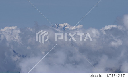 Mont Blanc peak within clouds seen from Switzerland 87584237
