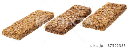 Cereal granola bars isolated on white background Cereal granola bars isolated on white background 87592383