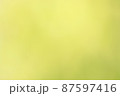 やや緑っぽいうぐいす色の背景素材 87597416