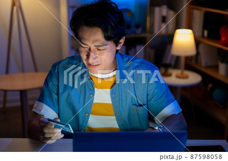 man online shopping with card man online shopping with card 87598058