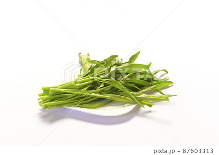 Morning glory is a vegetable isolated on white background. Morning glory is a vegetable isolated on white background. 87603313