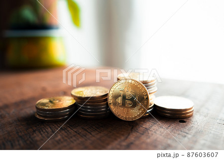 Crypto coins and graphs in the computer screen 87603607