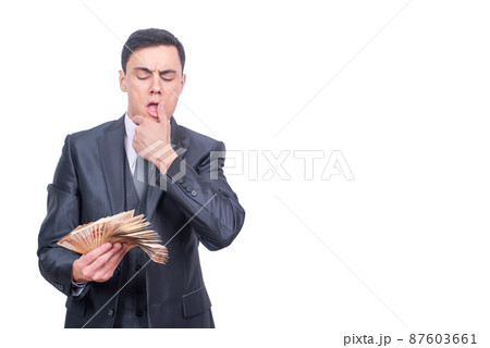 Rich man in formal wear counting money 87603661