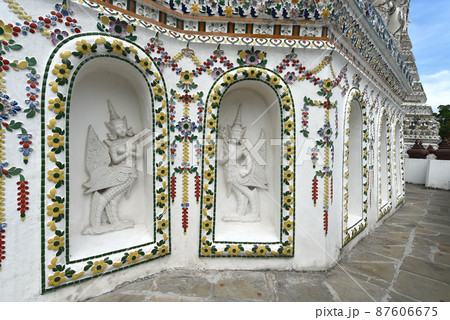 Thai art, Angle sculpture in window, Nice artwork decorate at Buddhist temple (Wat Arun) Thailand Thai art, Angle sculpture in window, Nice artwork decorate at Buddhist temple (Wat Arun) Thailand 87606675